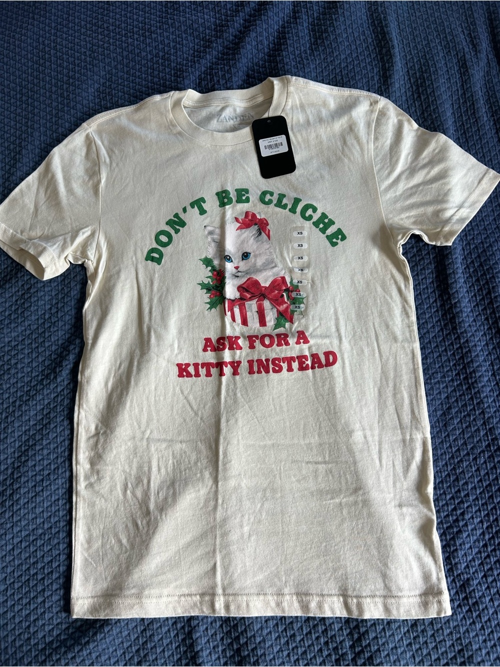 Zanden | Don't Be Cliche Kitty Graphic Tee - Cream with Red & Green Print